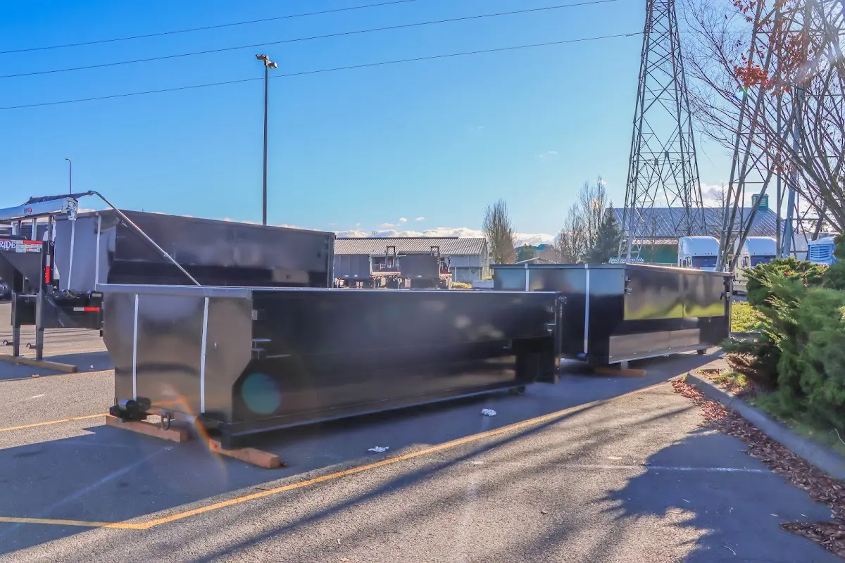 Roll-off dumpster ready for waste disposal at job site for 15 Yard Dumpster Rental in Cody